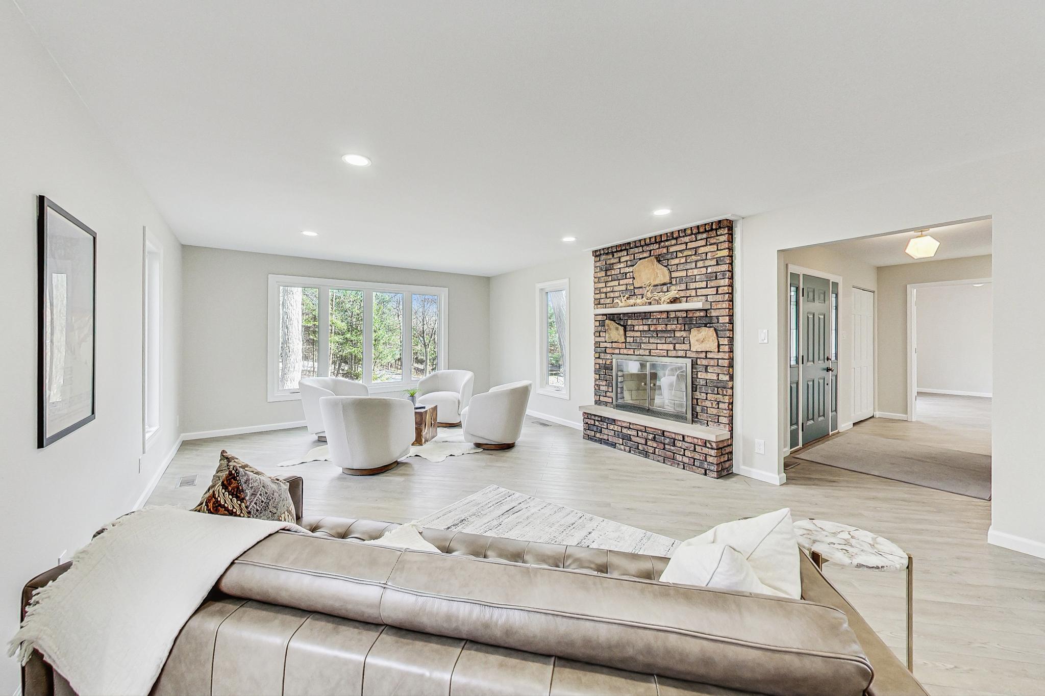 22 Chrismar Road Ogden Dunes, IN 46368 - Photo 3 of 26 a living room with furniture large window and table