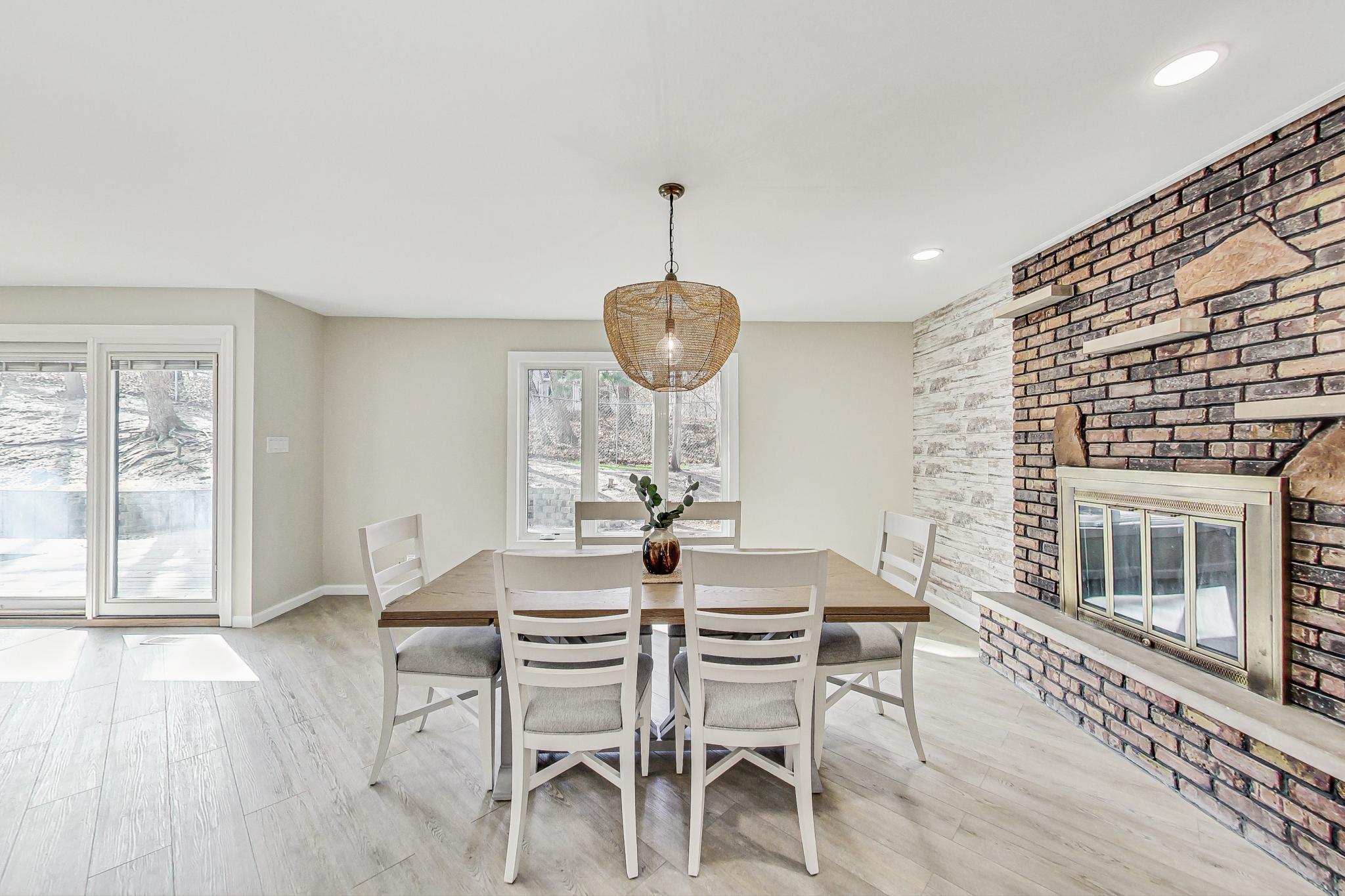 22 Chrismar Road Ogden Dunes, IN 46368 - Photo 6 of 26 a dining room with furniture window and wooden floor