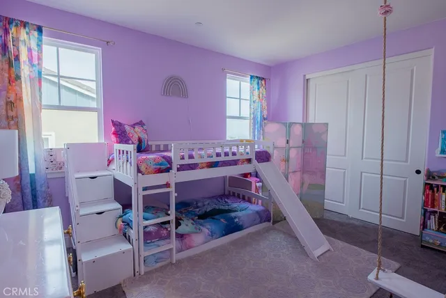 a utility room with sink dryer and washer