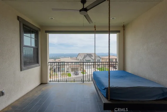 a view of a house with backyard and porch