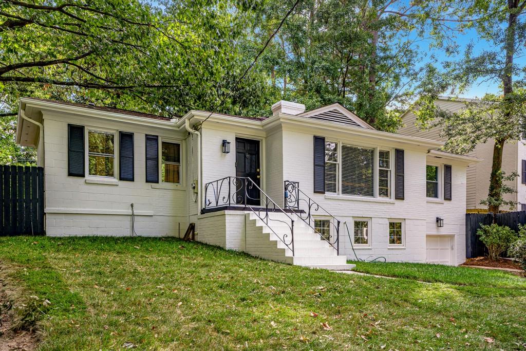 1821 Fernwood Road Northwest Atlanta, GA 30318 - Photo 1 of 1 a view of house with yard