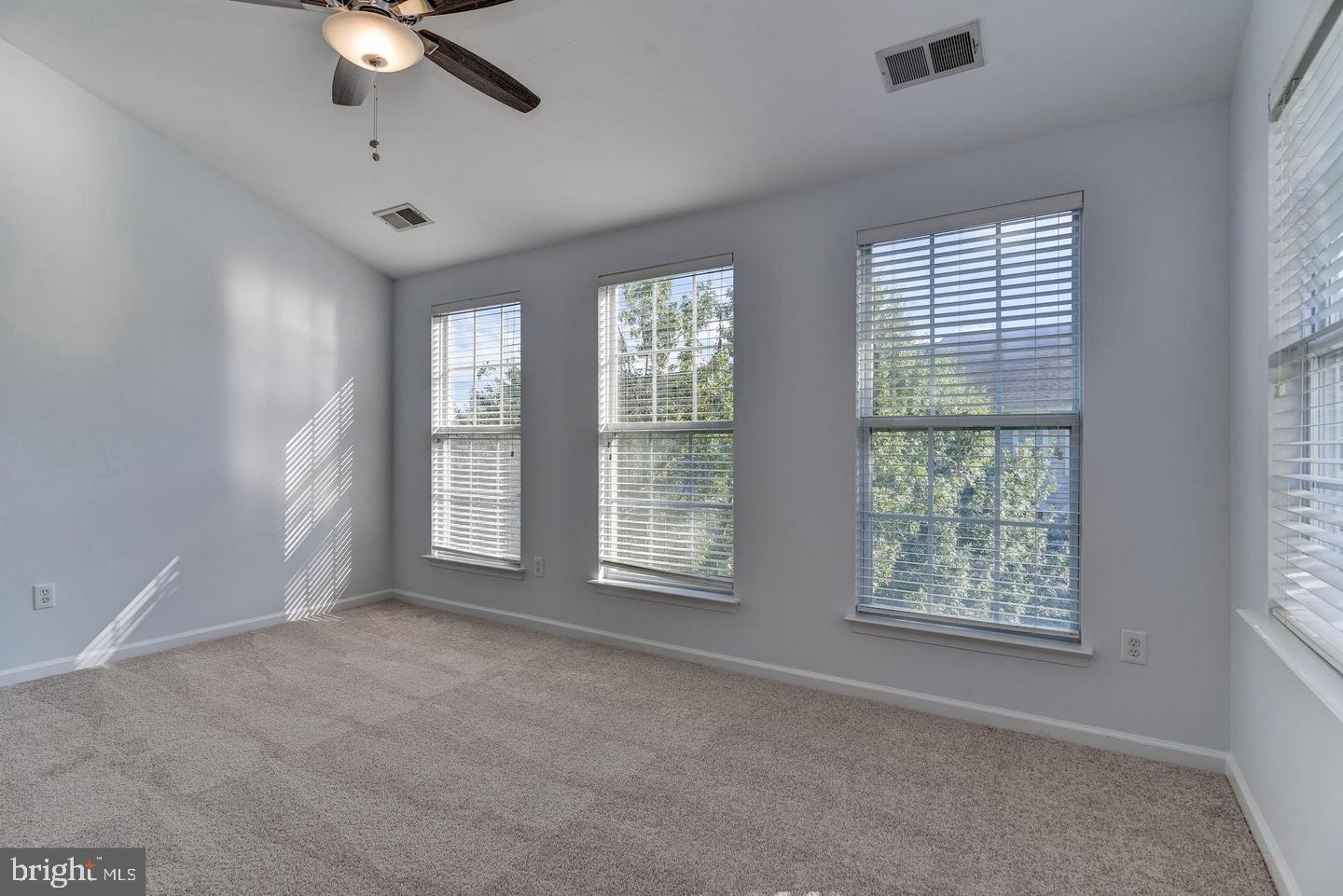 640 Main Street, Unit 640B Gaithersburg, MD 20878 - Photo 30 of 65 a view of an empty room with a window