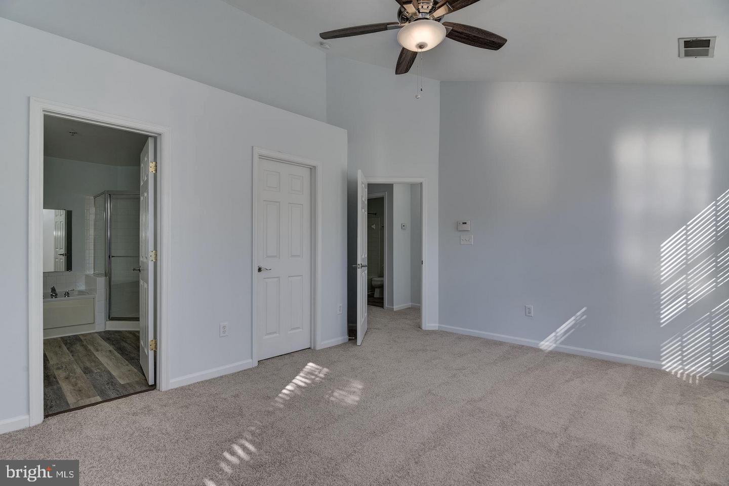 640 Main Street, Unit 640B Gaithersburg, MD 20878 - Photo 31 of 65 en empty room with fan and window