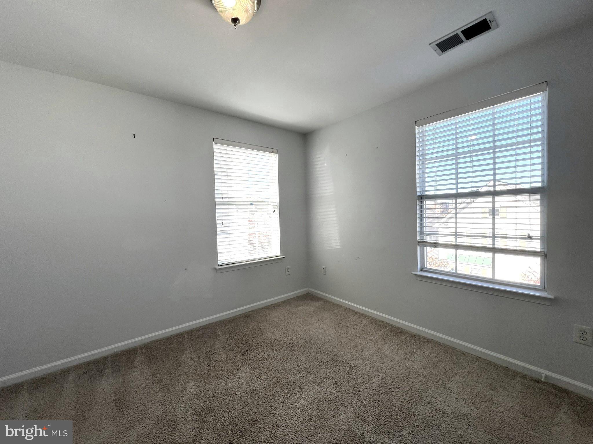 640 Main Street, Unit 640B Gaithersburg, MD 20878 - Photo 35 of 65 an empty room with a window