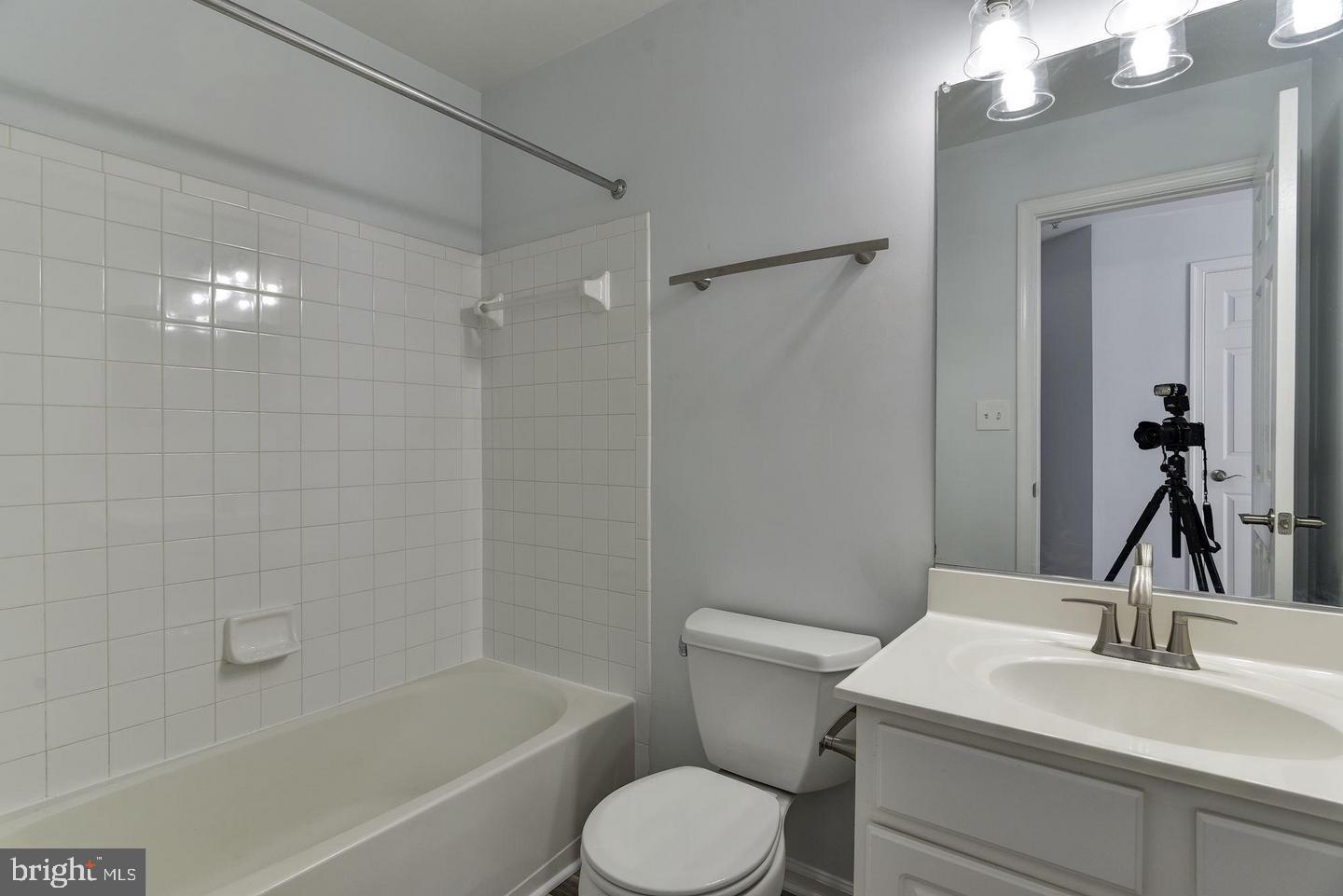 640 Main Street, Unit 640B Gaithersburg, MD 20878 - Photo 40 of 65 a bathroom with a sink toilet and shower