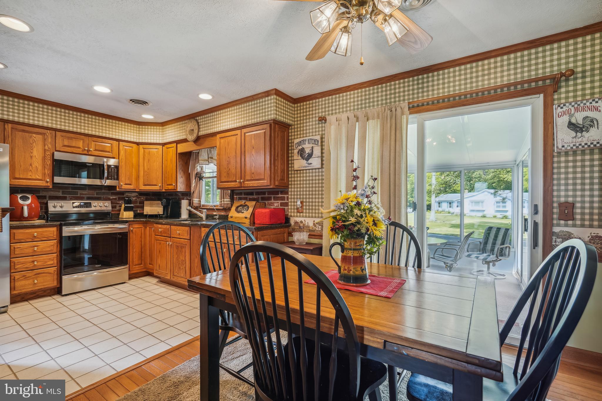 2941 Money Make Road Trappe, MD 21673 - Photo 13 of 47 Breakfast area leads to the sunroom