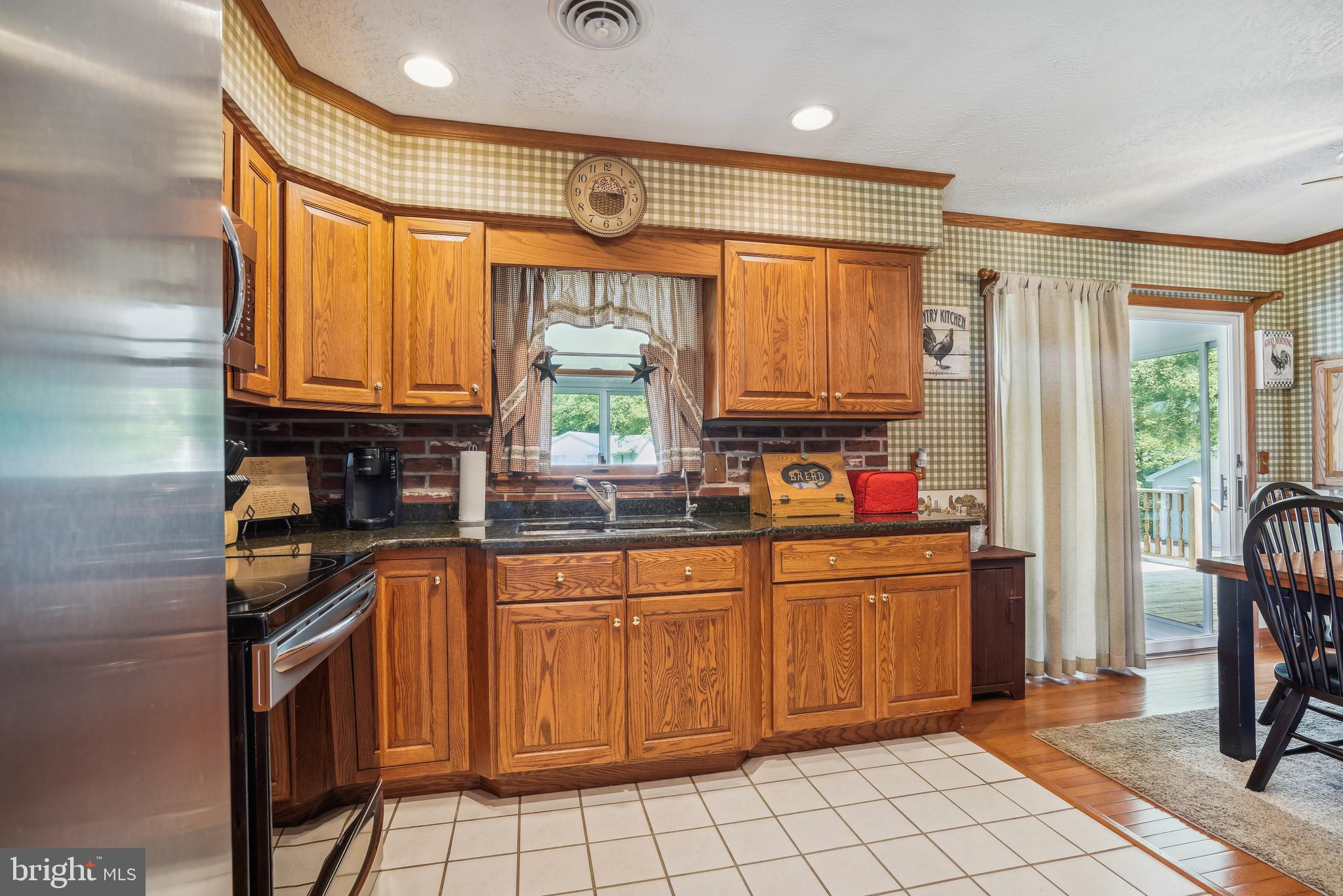 2941 Money Make Road Trappe, MD 21673 - Photo 10 of 47 Oak cabinets with granite counters