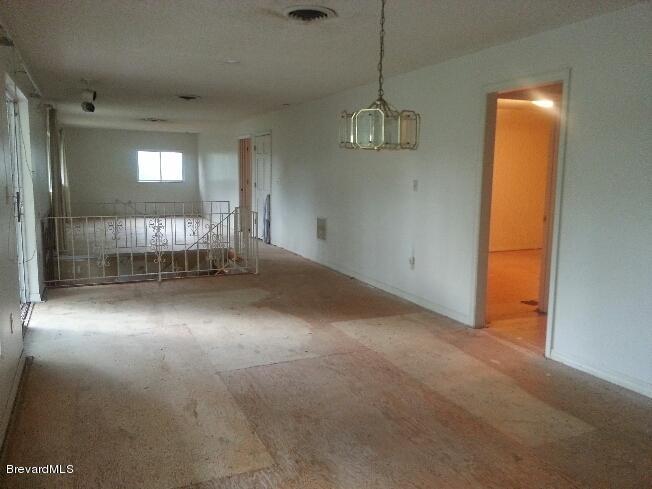 2691 Harlock Road Melbourne, FL 32934 - Photo 7 of 10 Upstairs Living Area