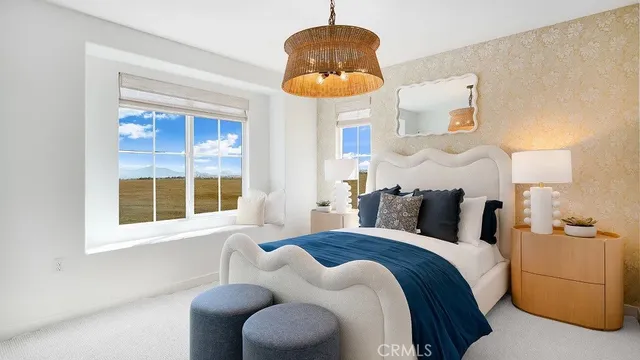 a bedroom with bed and a window