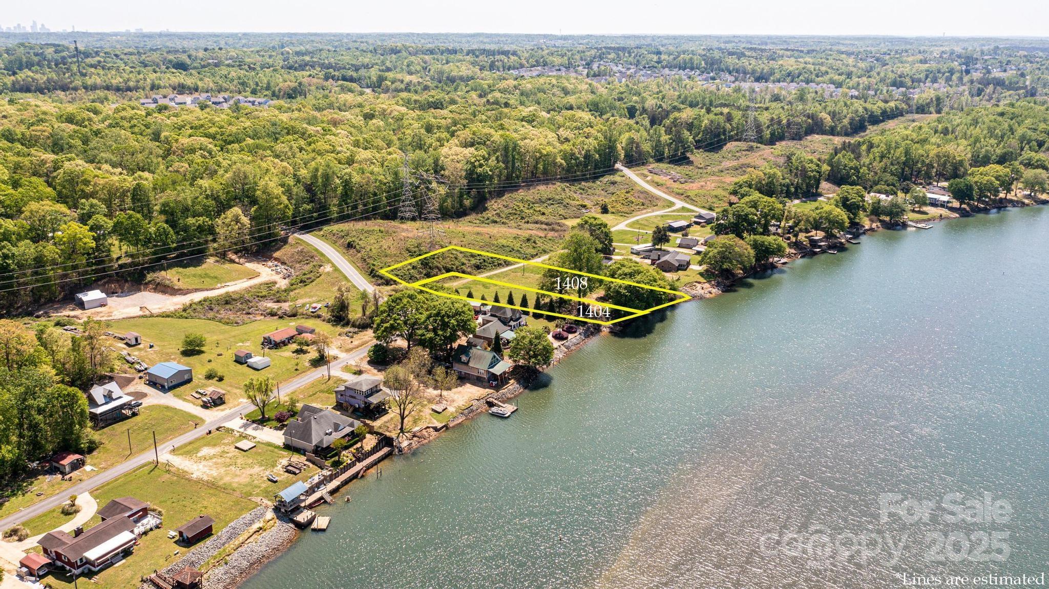 1404 Hart Road Charlotte, NC 28214 - Photo 2 of 9 a view of a lake in middle of the town