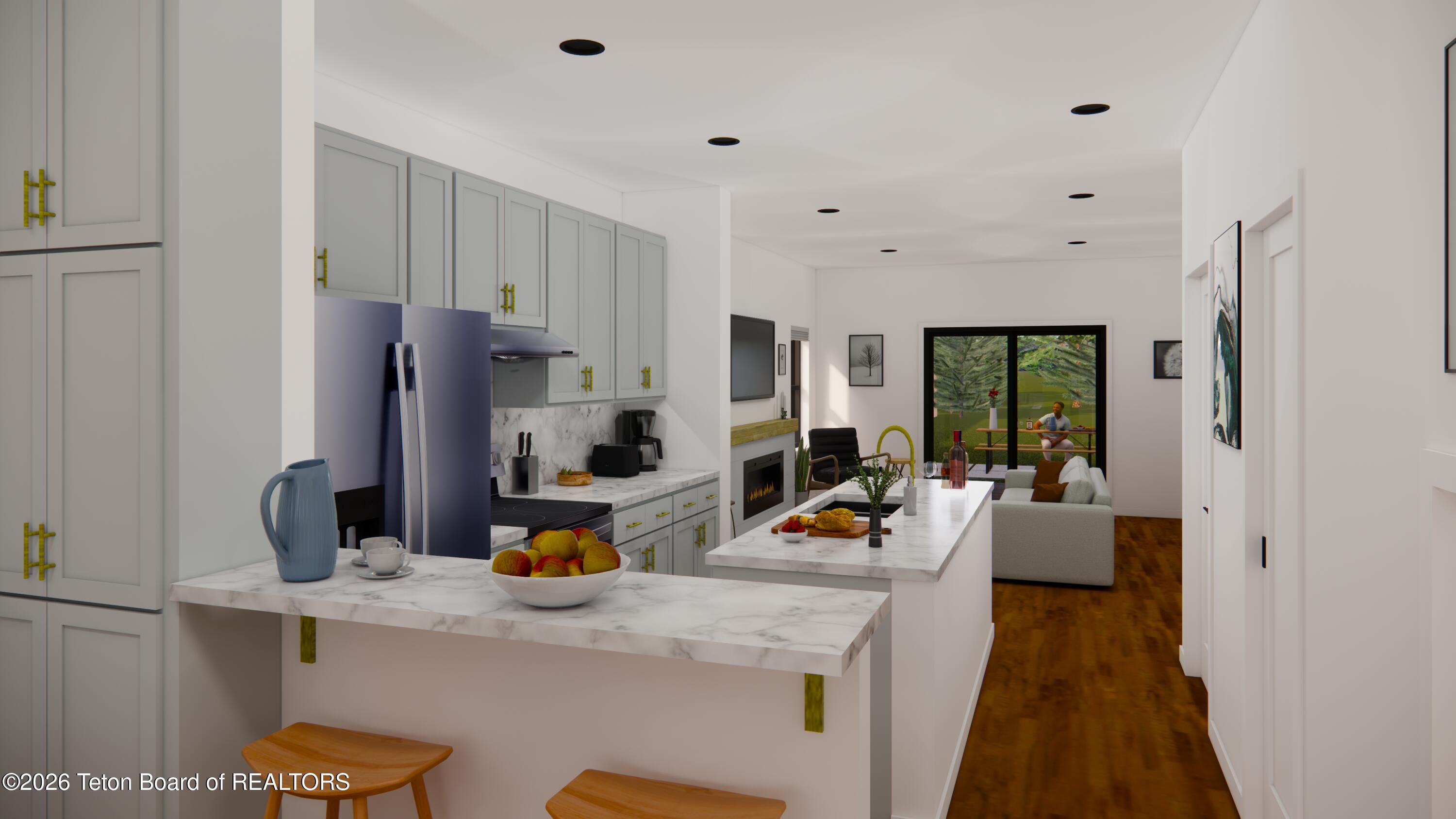 8748 Windy Ridge Road Victor, ID 83455 - Photo 3 of 15 Taylor Kitchen from Entry