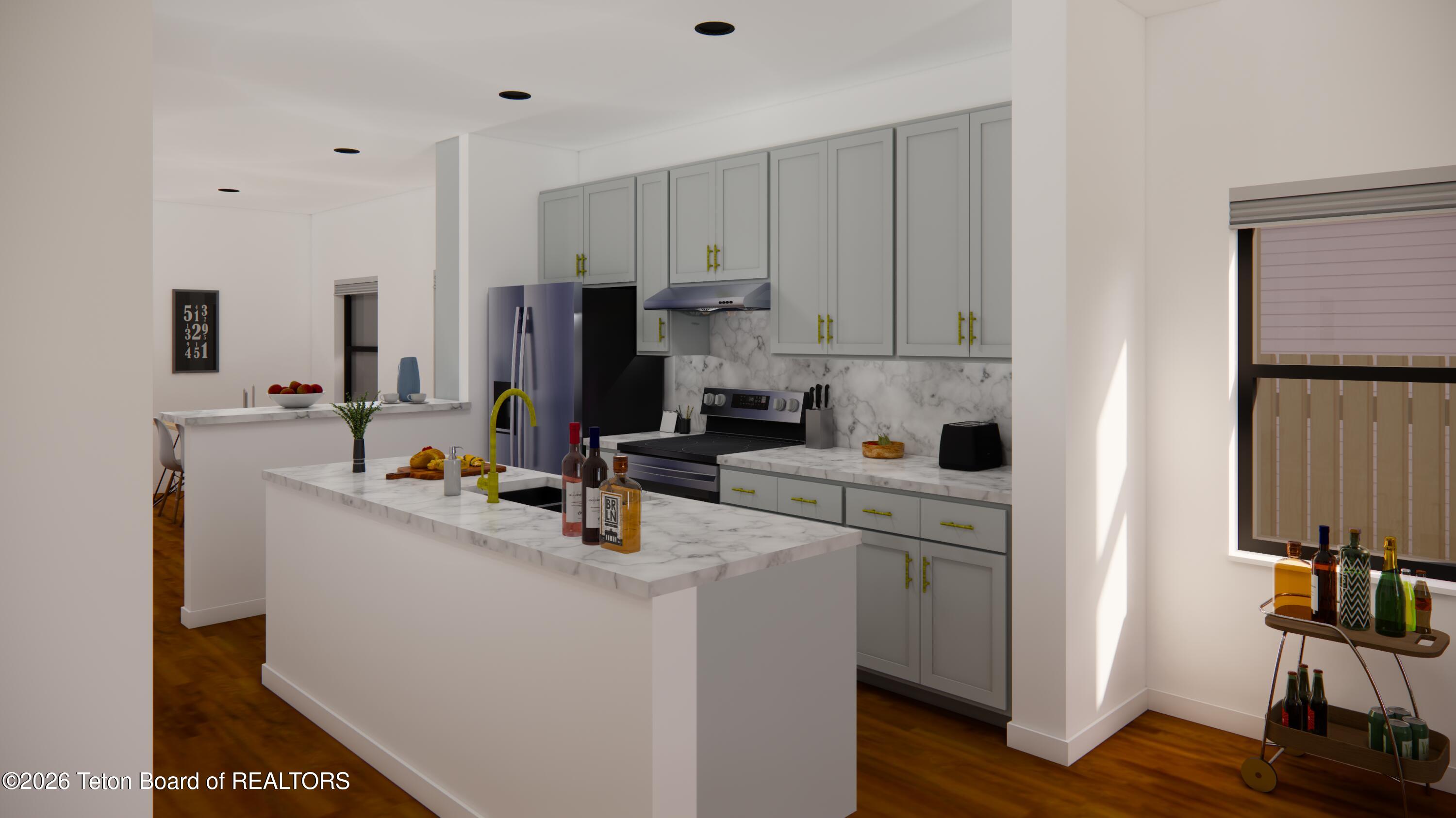 8748 Windy Ridge Road Victor, ID 83455 - Photo 4 of 15 Taylor Kitchen from Living Room