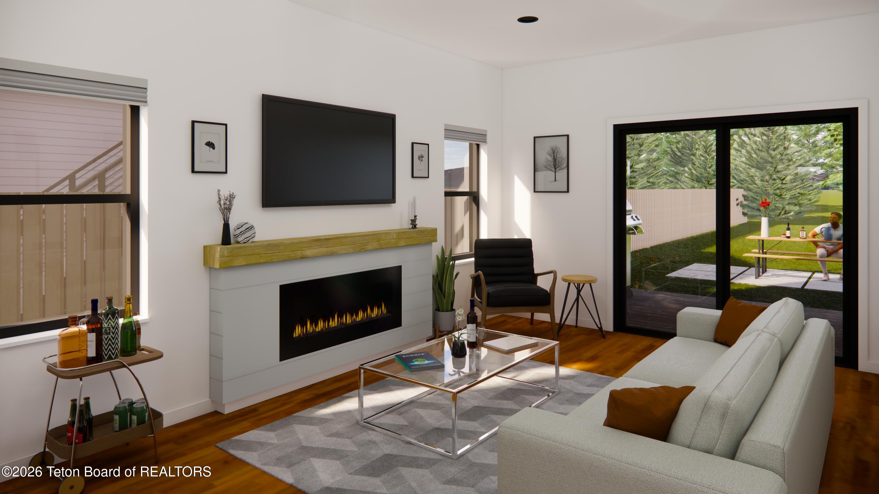 8748 Windy Ridge Road Victor, ID 83455 - Photo 6 of 15 Taylor Living Room 2