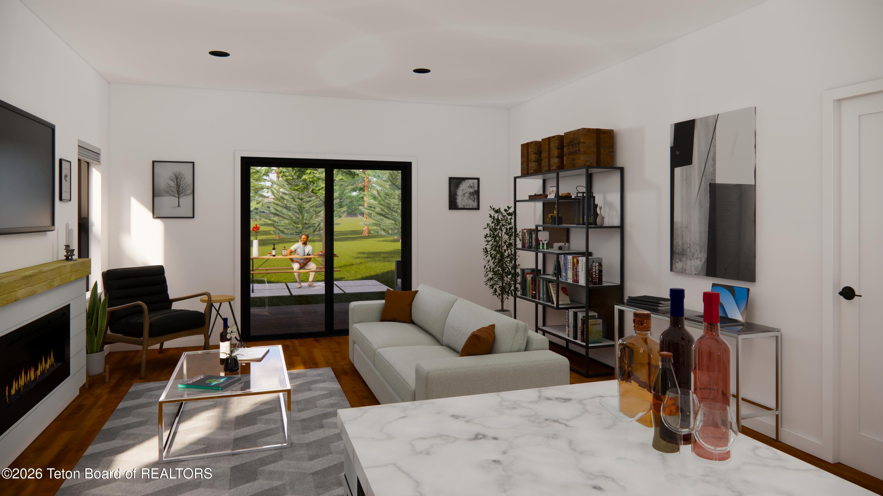 8748 Windy Ridge Road Victor, ID 83455 - Photo 7 of 15 Taylor Living Room from Kitchen