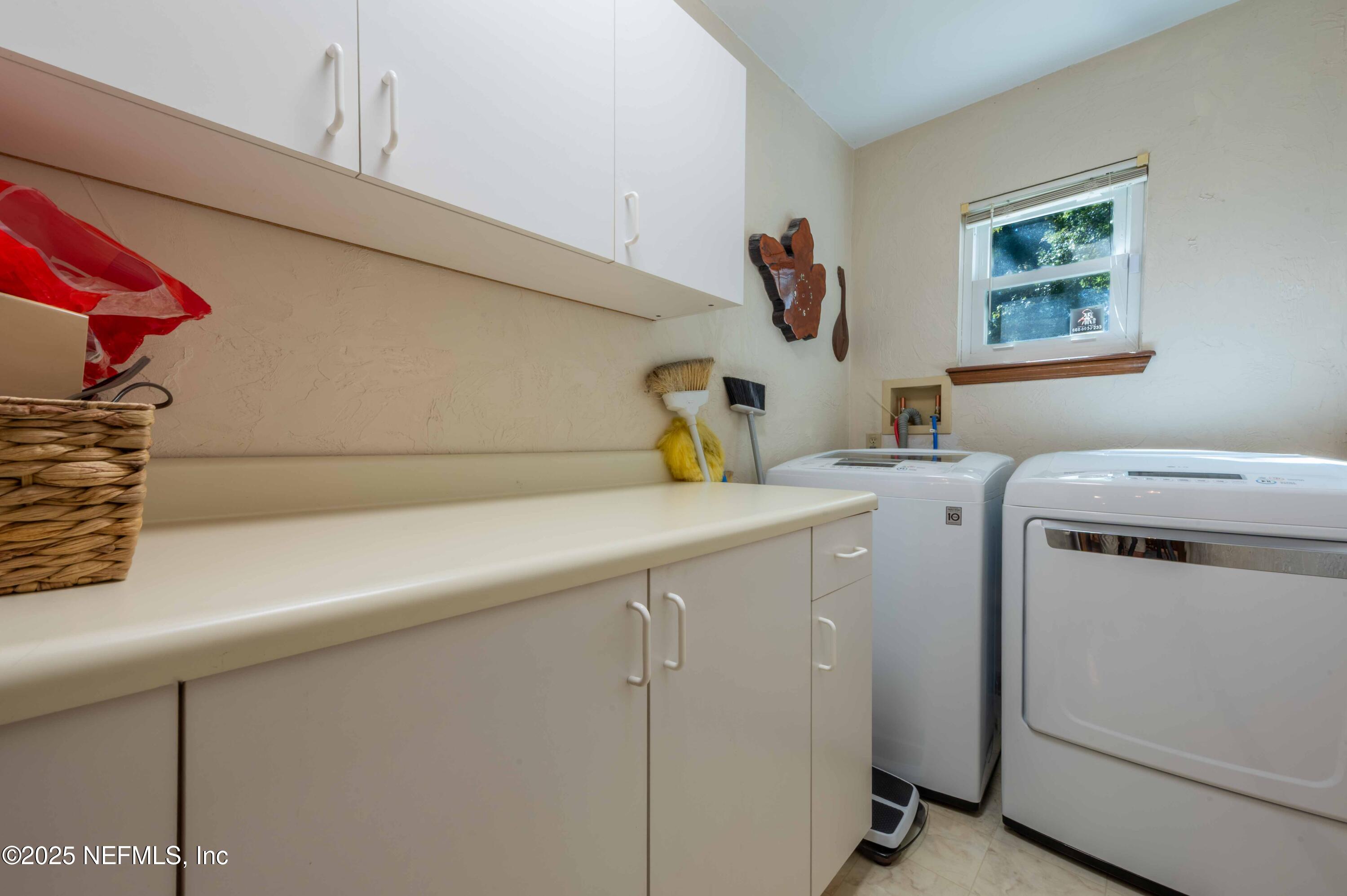 878 Champion Way Jacksonville, FL 32221 - Photo 17 of 36 2025_09_27 878 Champion Way-106-laundry