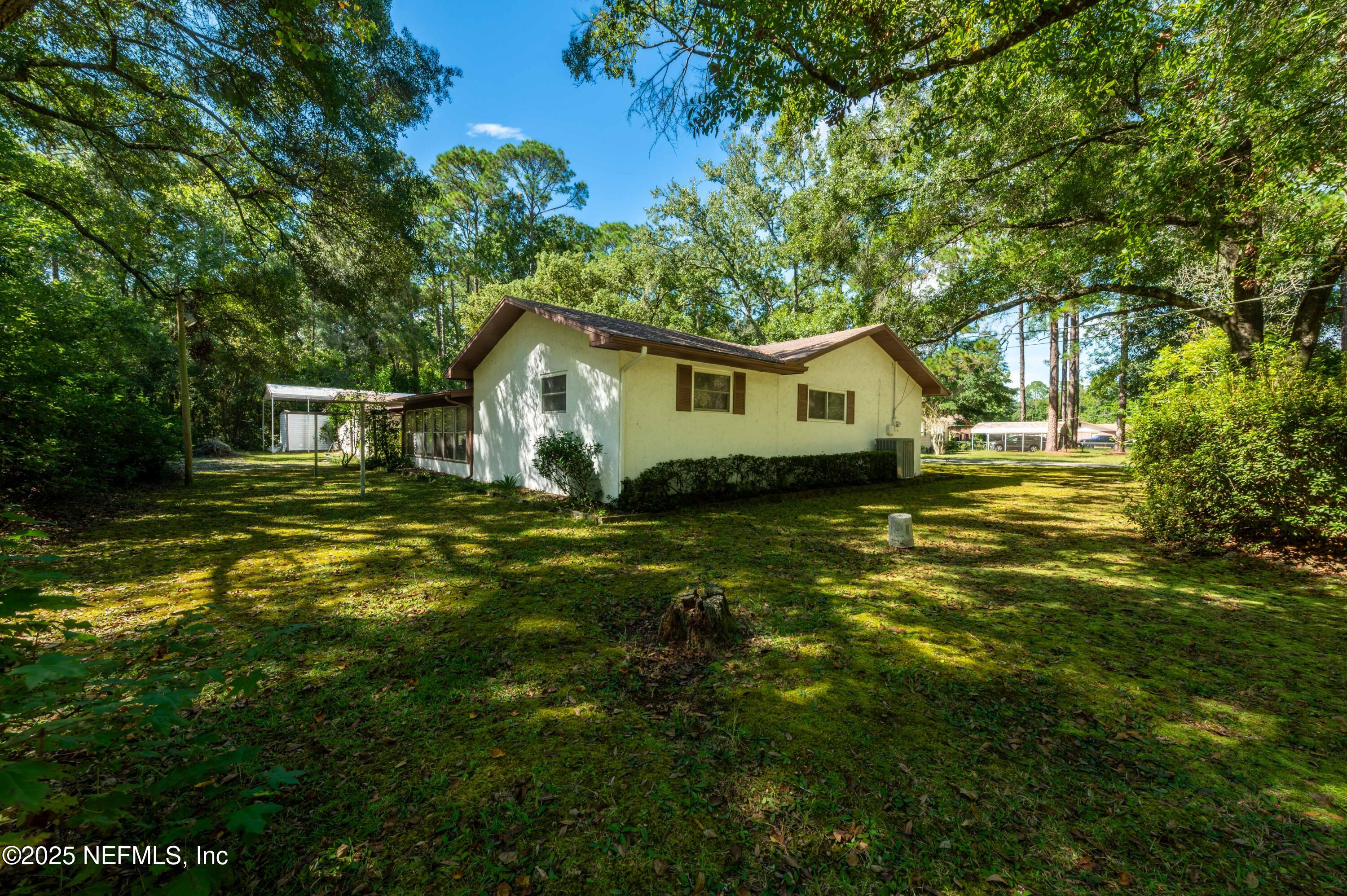 878 Champion Way Jacksonville, FL 32221 - Photo 3 of 36 2025_09_27 878 Champion Way-19-backyard