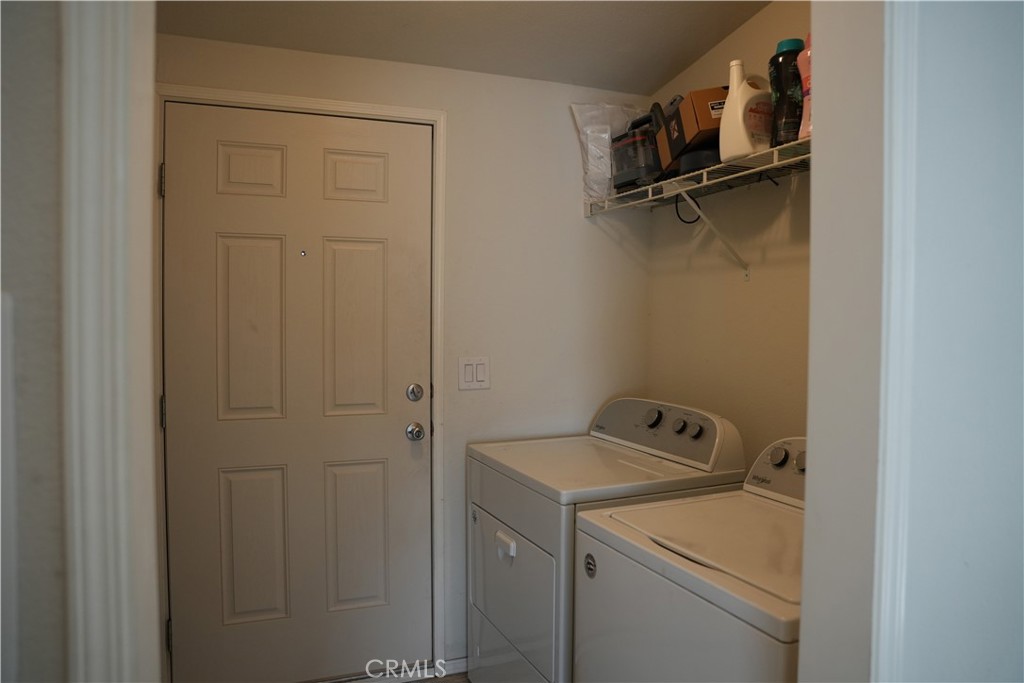 6545 Wilbur, Unit 39 Reseda, CA 91335 - Photo 17 of 27 a utility room with dryer and washer