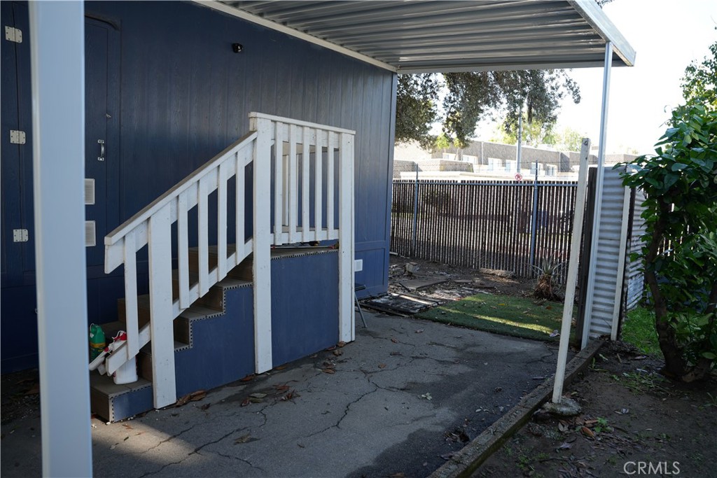 6545 Wilbur, Unit 39 Reseda, CA 91335 - Photo 18 of 27 a view of a porch with wooden floor and outdoor space