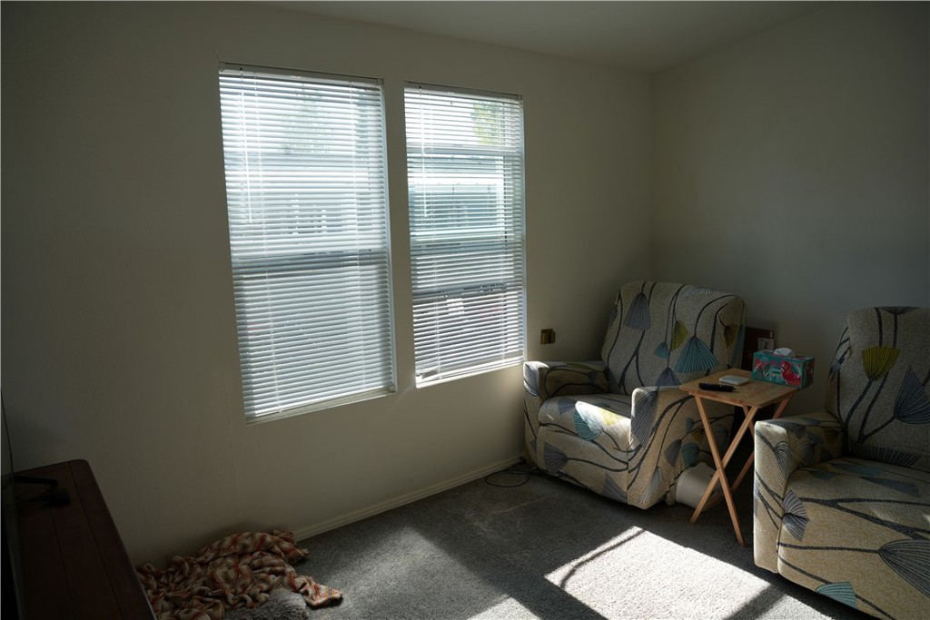 6545 Wilbur, Unit 39 Reseda, CA 91335 - Photo 3 of 27 a living room with furniture and a window