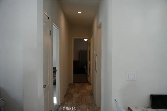 a view of a hallway with closet