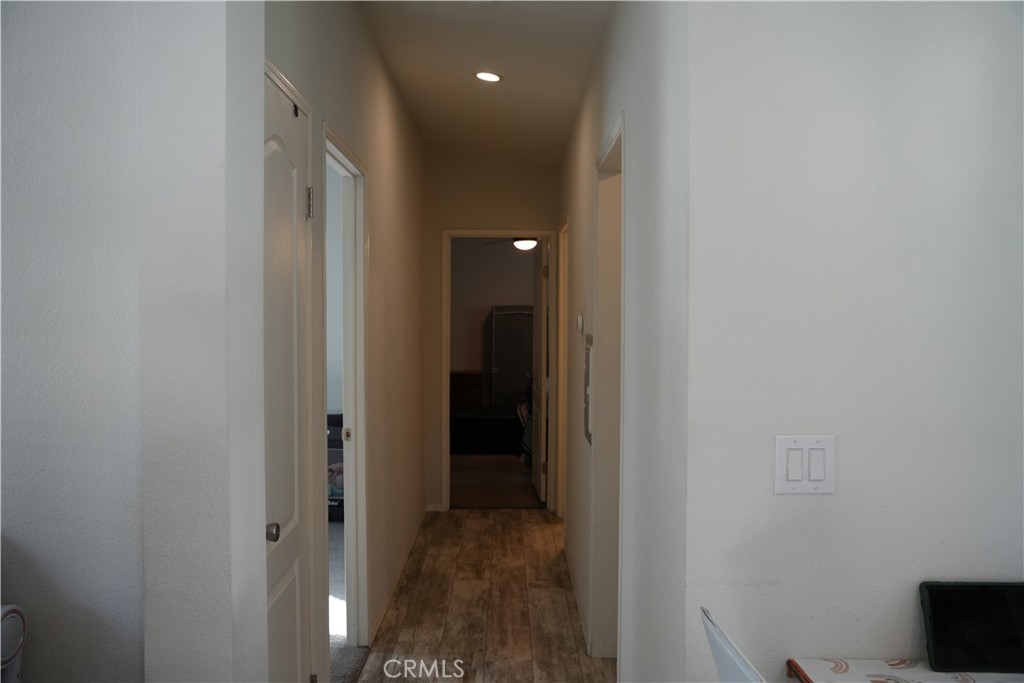 6545 Wilbur, Unit 39 Reseda, CA 91335 - Photo 9 of 27 a view of a hallway with closet
