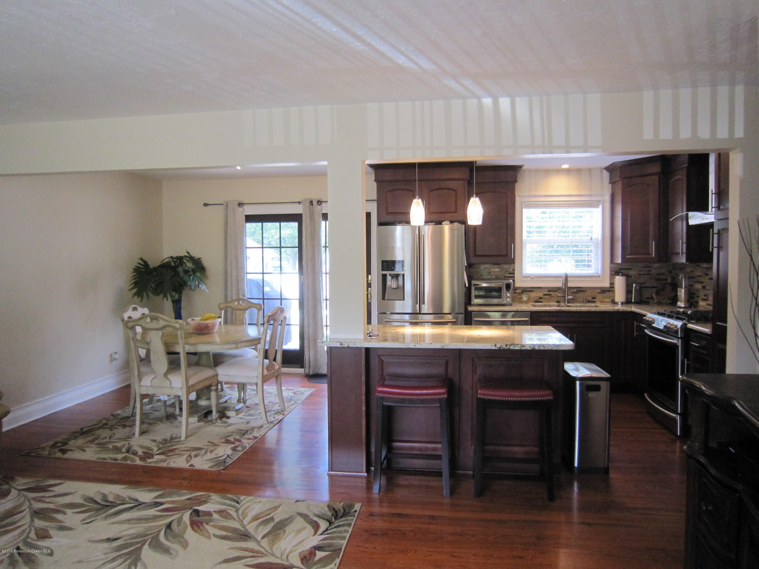 158 Newbury Road Howell, NJ 07731 - Photo 3 of 19 a view of a dining room with furniture