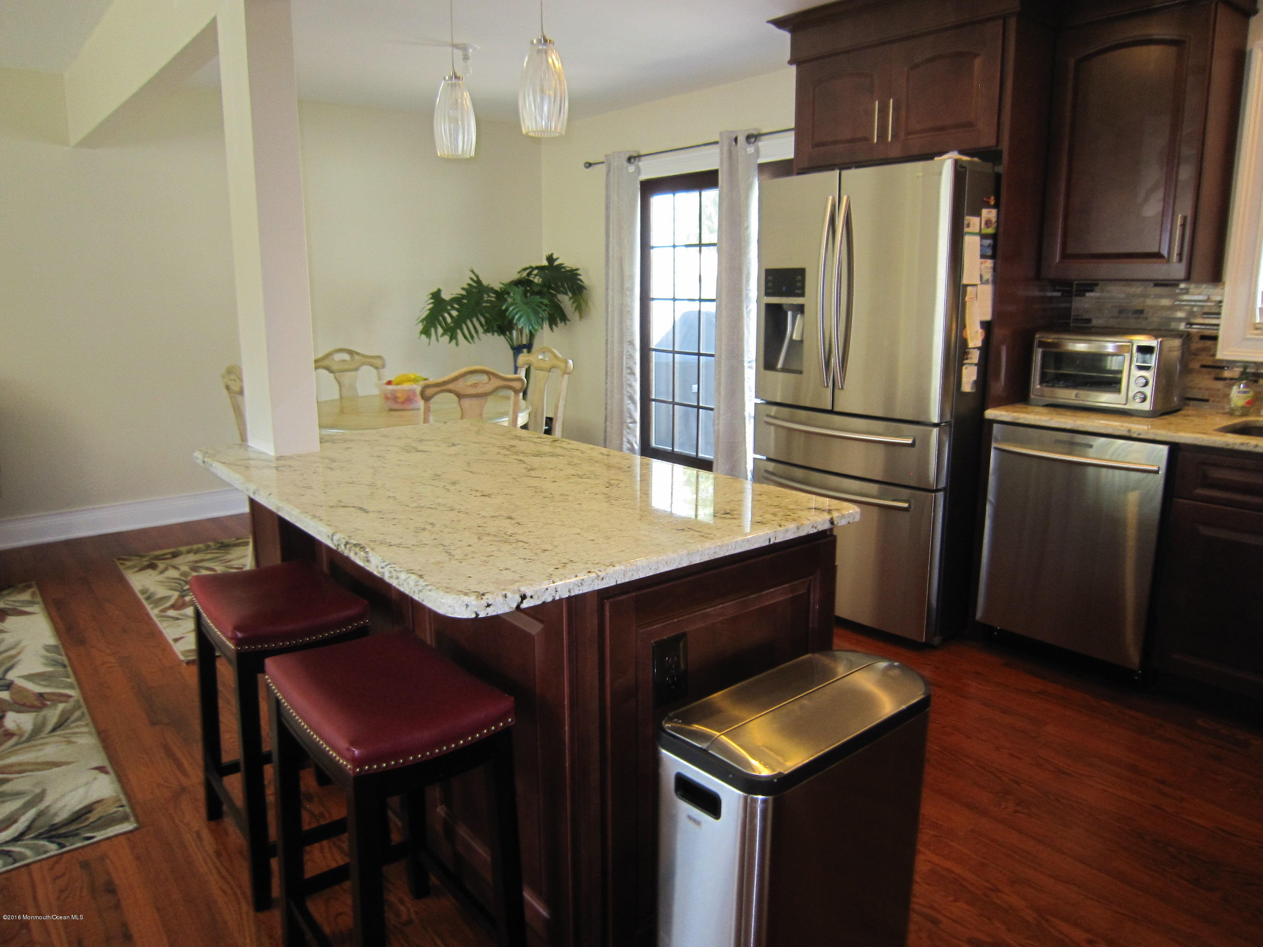 158 Newbury Road Howell, NJ 07731 - Photo 5 of 19 a kitchen with stainless steel appliances granite countertop a refrigerator a stove a sink and a refrigerator