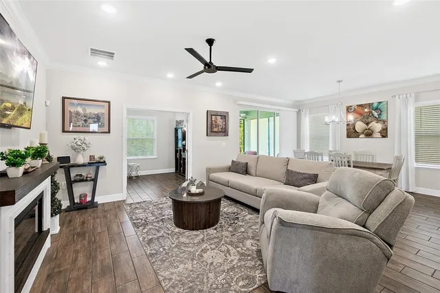 a view of a livingroom with furniture and windows