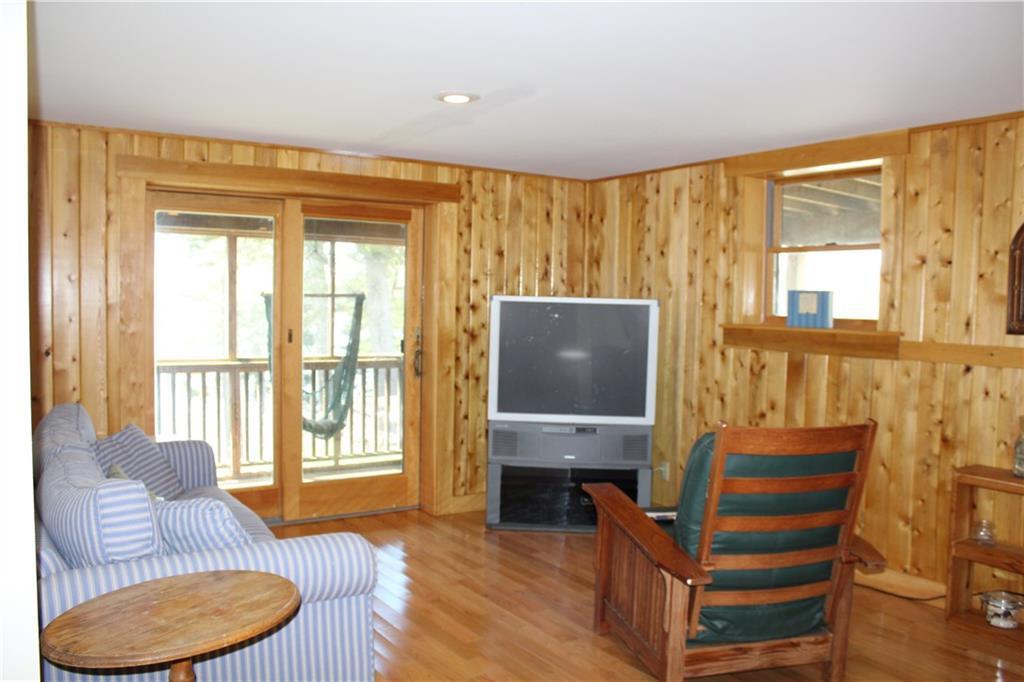 149 Chambers Point Road Roque Bluffs, ME 04654 - Photo 32 of 35 Basement living room with slider...