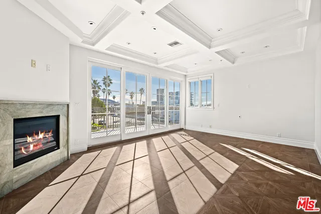 a view of a livingroom with furniture and a rug