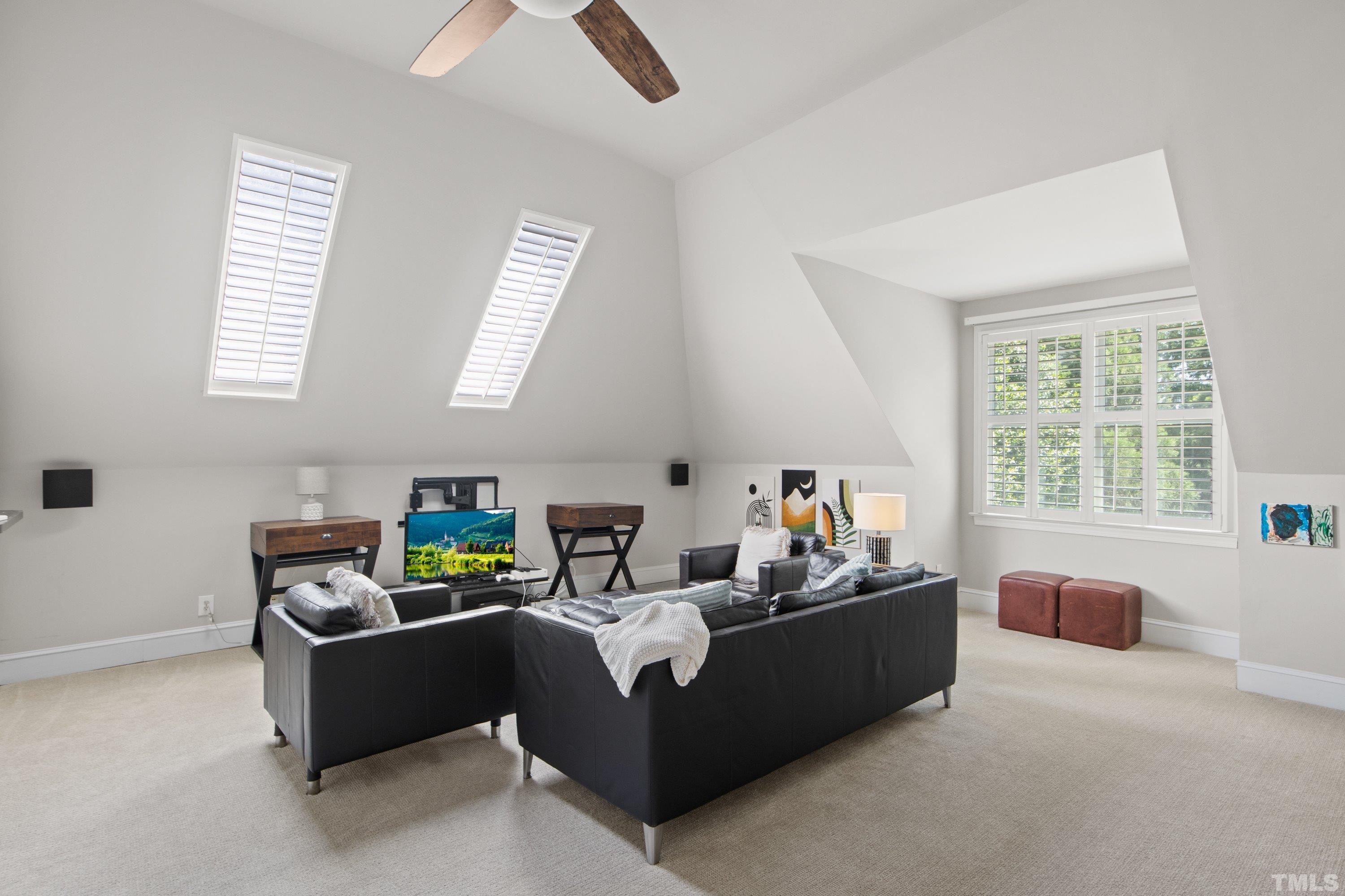115 Carpathian Way Raleigh, NC 27615 - Photo 38 of 52 a living room with furniture and a window