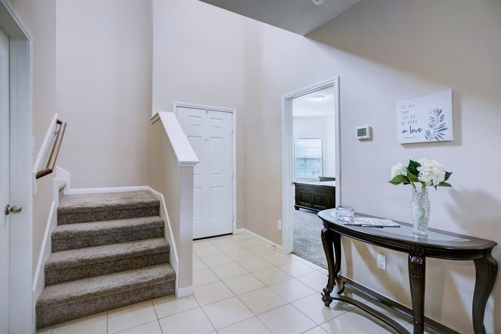 1303 Emerald Stone Drive Rosharon, TX 77583 - Photo 2 of 25 Inviting entrance that immediately feels like home with warm tones and abundant natural light.