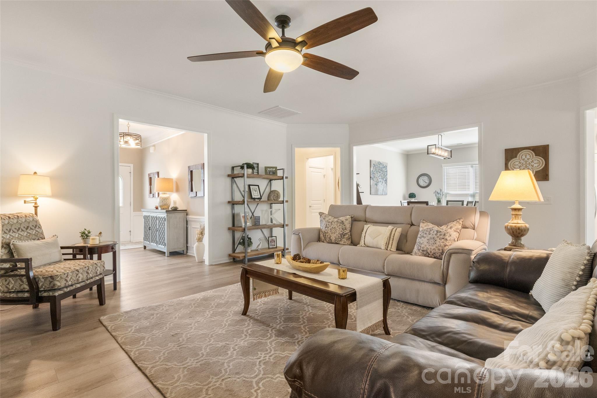 1002 Falling Leaf Street Indian Land, SC 29707 - Photo 12 of 45 a living room with furniture and a lamp