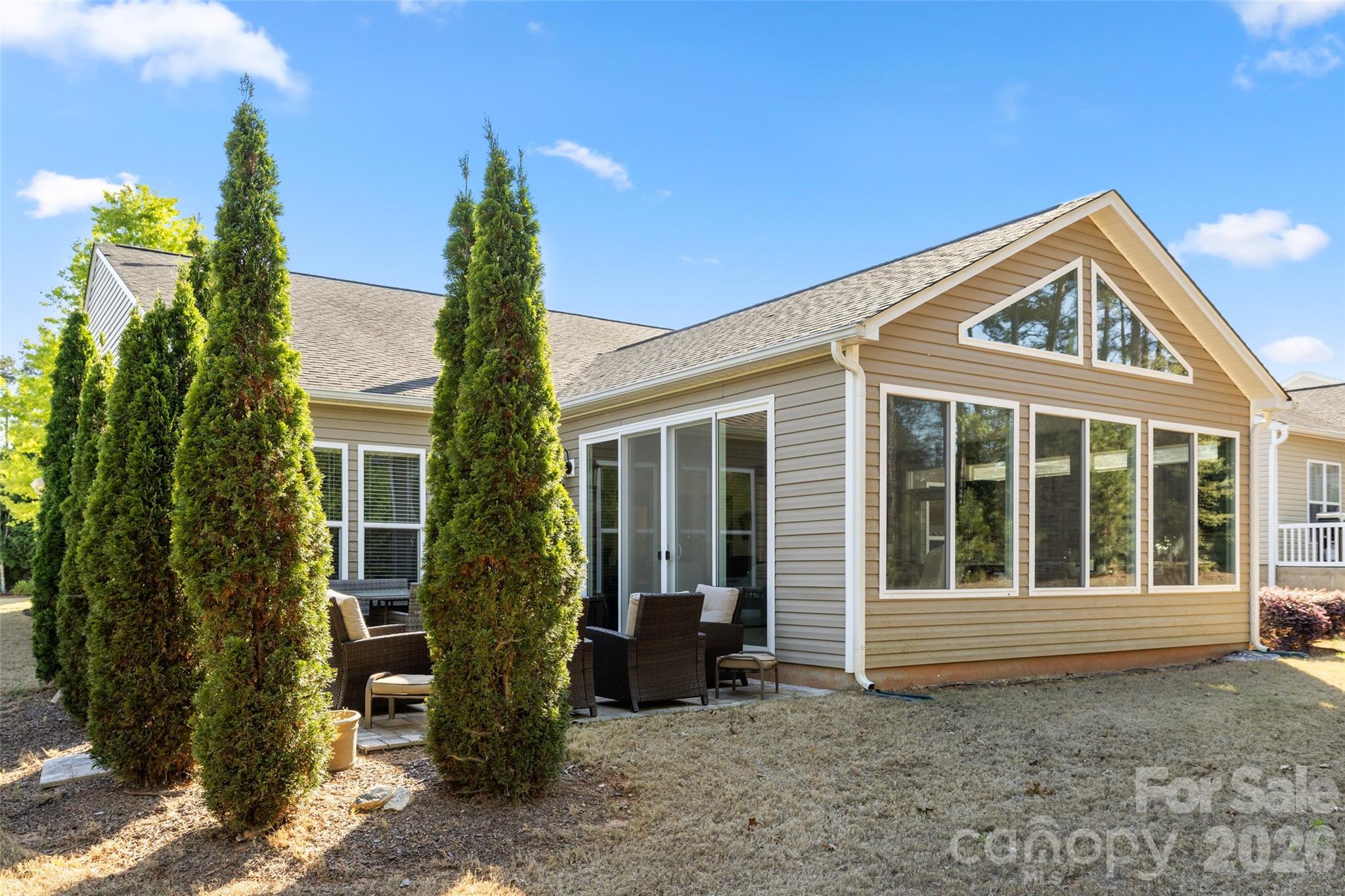 1002 Falling Leaf Street Indian Land, SC 29707 - Photo 31 of 45 a front view of a house with garden