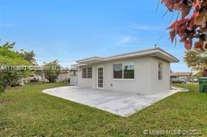 5391 West 9th Lane Hialeah, FL 33012 - Photo 12 of 22 a view of a house with a yard