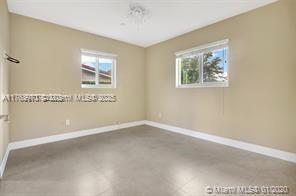 5391 West 9th Lane Hialeah, FL 33012 - Photo 15 of 22 an empty room with windows