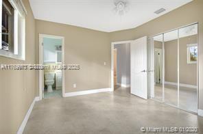 5391 West 9th Lane Hialeah, FL 33012 - Photo 16 of 22 wooden floor and an entryway in a room
