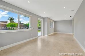 5391 West 9th Lane Hialeah, FL 33012 - Photo 18 of 22 a view of an empty room with a window
