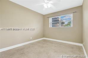 5391 West 9th Lane Hialeah, FL 33012 - Photo 4 of 22 an empty room with a window