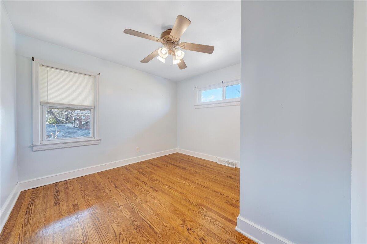 2346 Berkley Avenue Southwest Roanoke, VA 24015 - Photo 13 of 50 a view of empty room with wooden floor