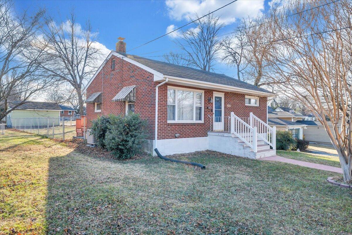 2346 Berkley Avenue Southwest Roanoke, VA 24015 - Photo 2 of 50 a view of a house with a yard