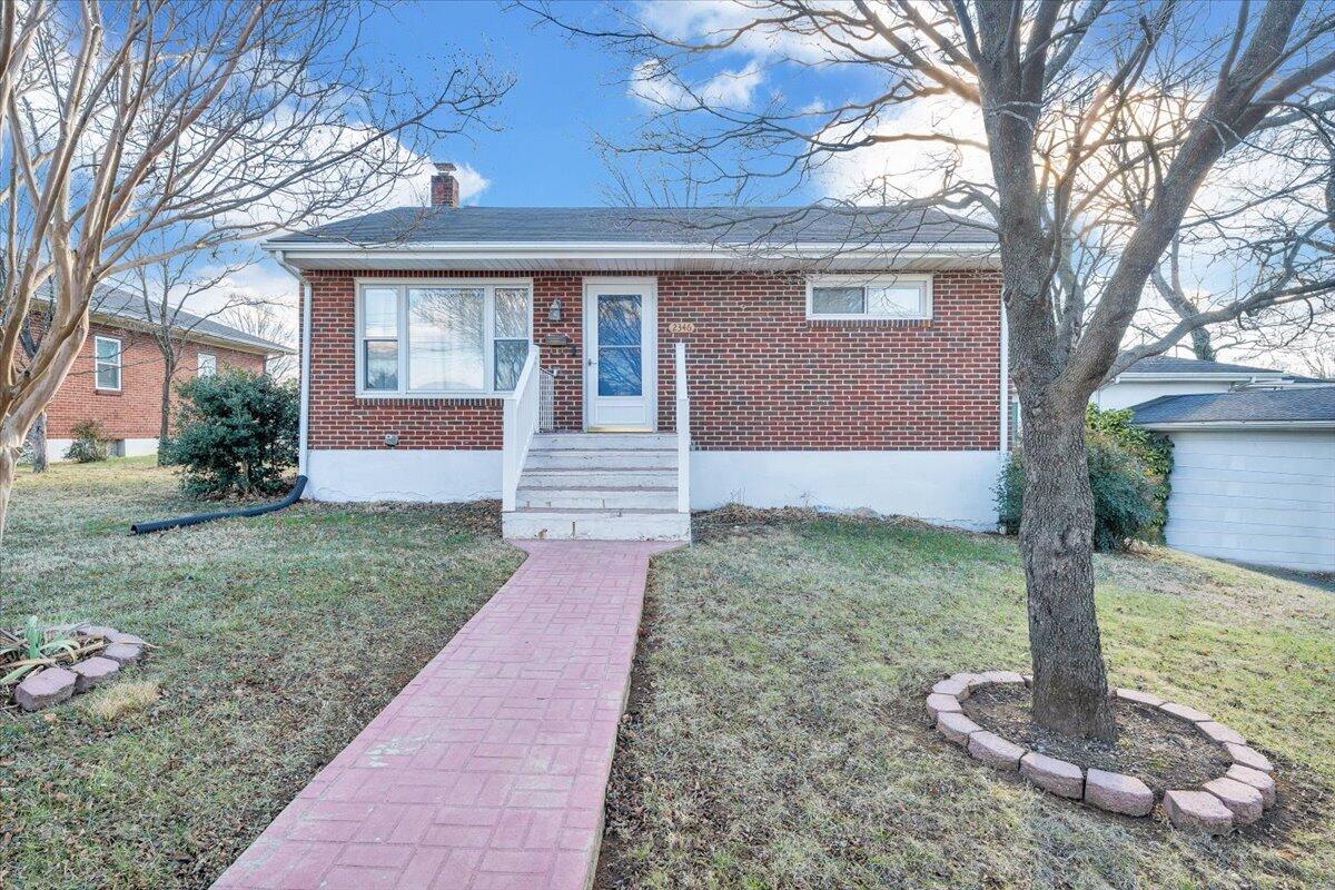 2346 Berkley Avenue Southwest Roanoke, VA 24015 - Photo 44 of 50 a front view of a house with garden