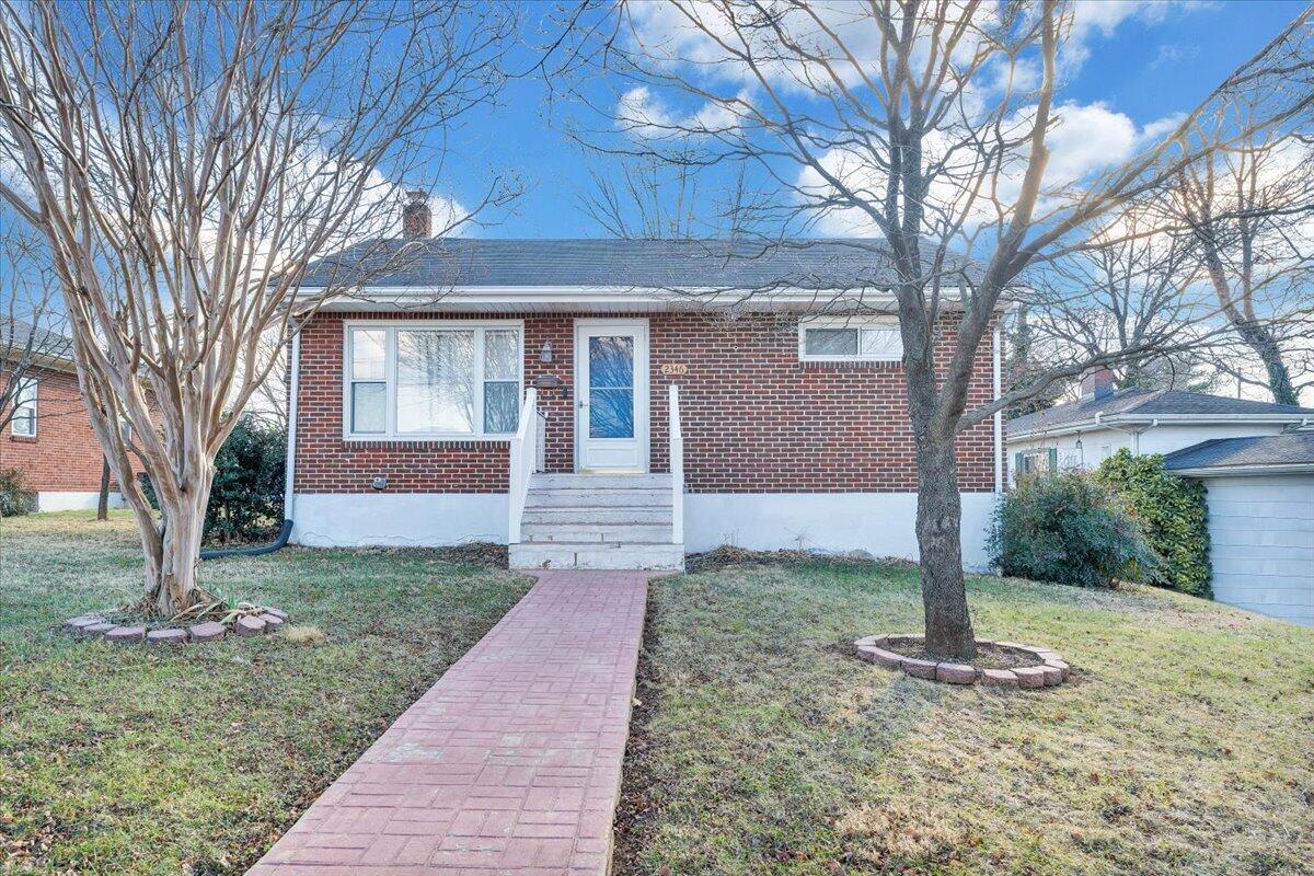 2346 Berkley Avenue Southwest Roanoke, VA 24015 - Photo 46 of 50 a front view of a house with garden