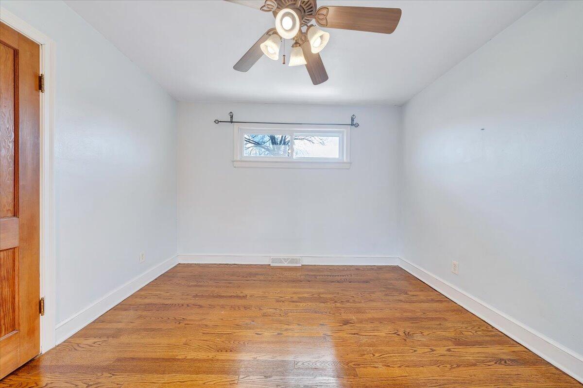 2346 Berkley Avenue Southwest Roanoke, VA 24015 - Photo 9 of 50 a view of empty room with wooden floor