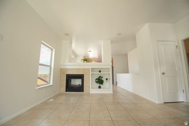 3365 Falcon Way Layton, UT 84040 - Photo 6 of 27 Main Level Living Room with Peninsula Fireplace