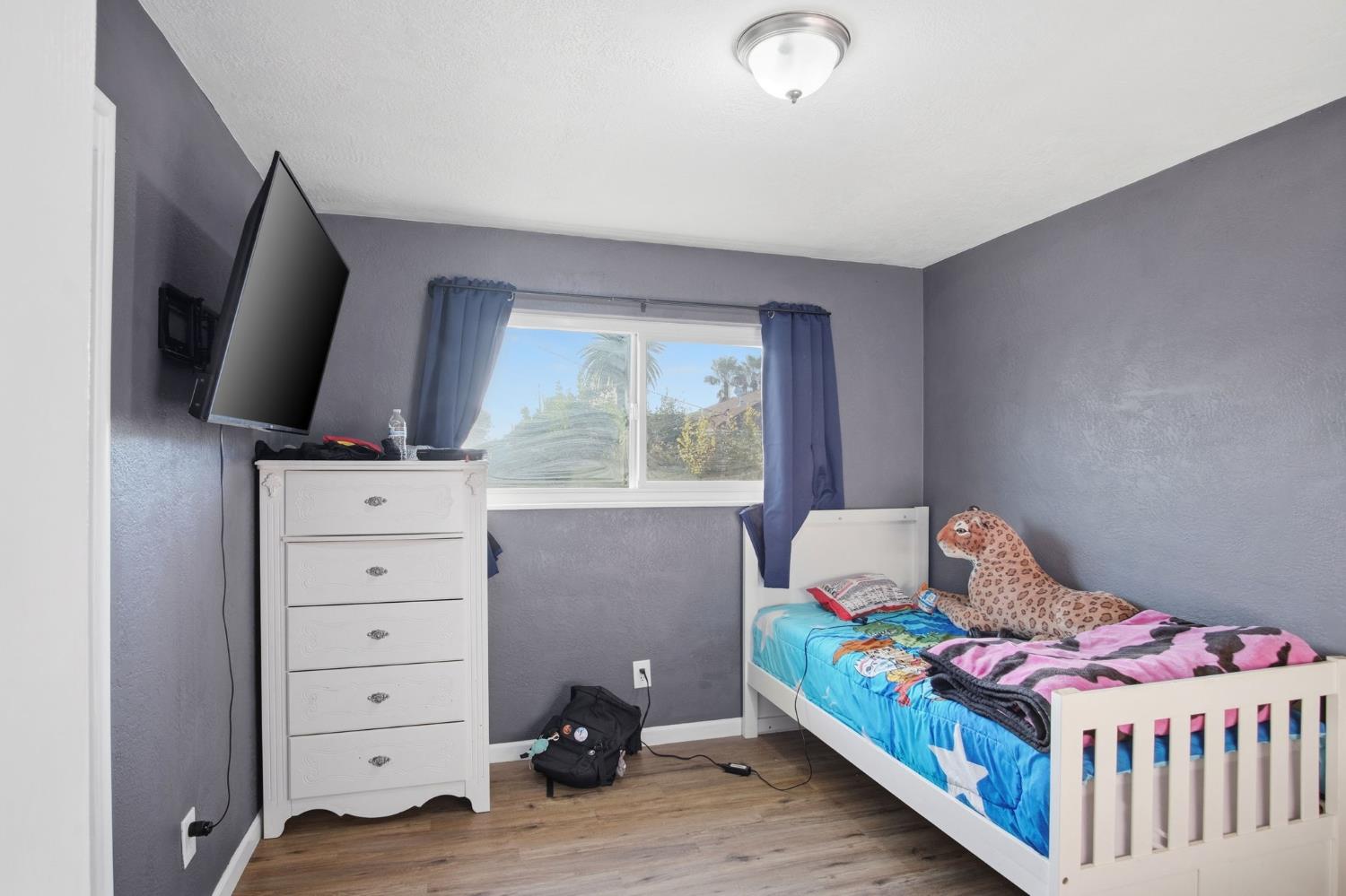 355 Harding Avenue Manteca, CA 95336 - Photo 12 of 21 a bedroom with a bed and window