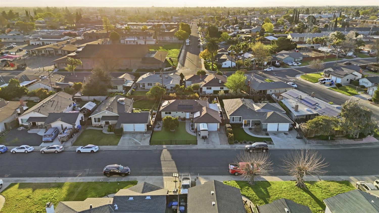 355 Harding Avenue Manteca, CA 95336 - Photo 20 of 21 an aerial view of residential houses with outdoor space and swimming pool
