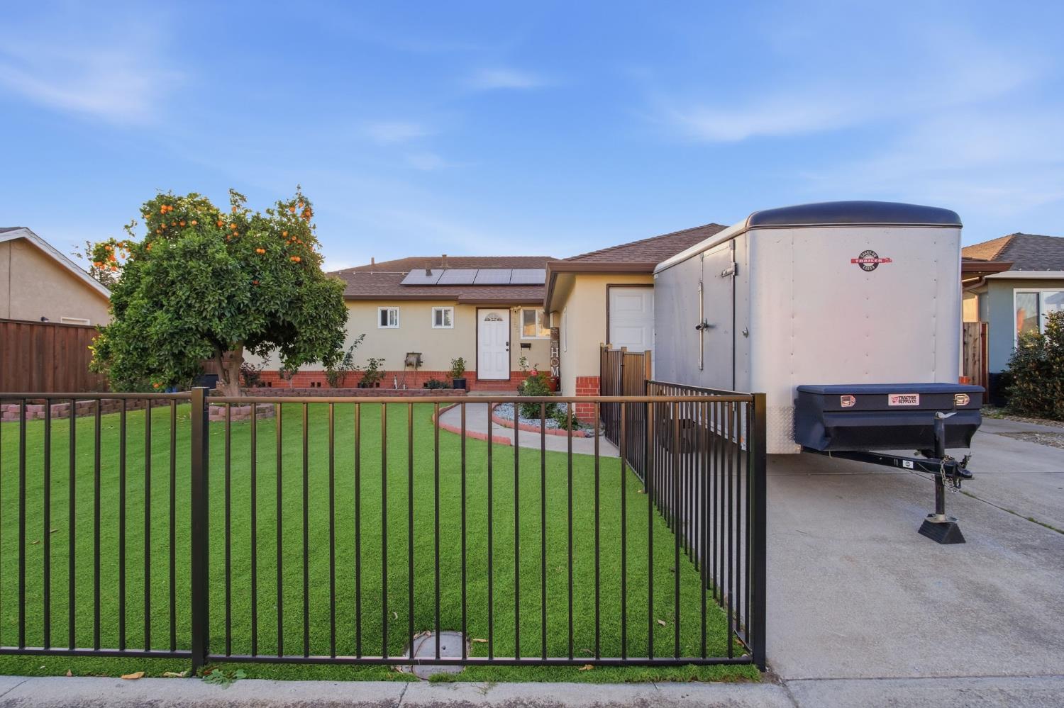 355 Harding Avenue Manteca, CA 95336 - Photo 2 of 21 a view of a house with backyard and deck