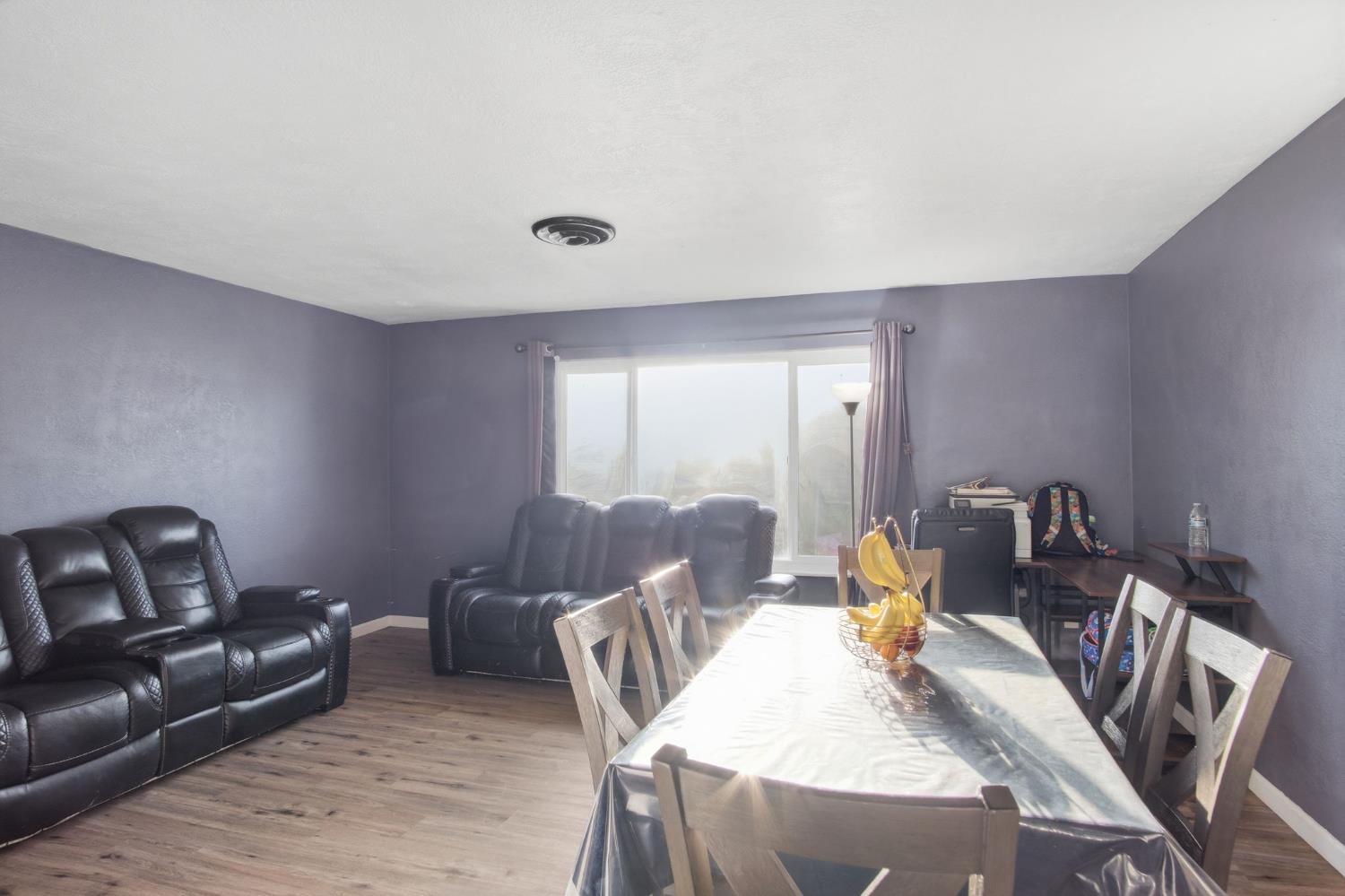 355 Harding Avenue Manteca, CA 95336 - Photo 6 of 21 a living room with furniture and wooden floor