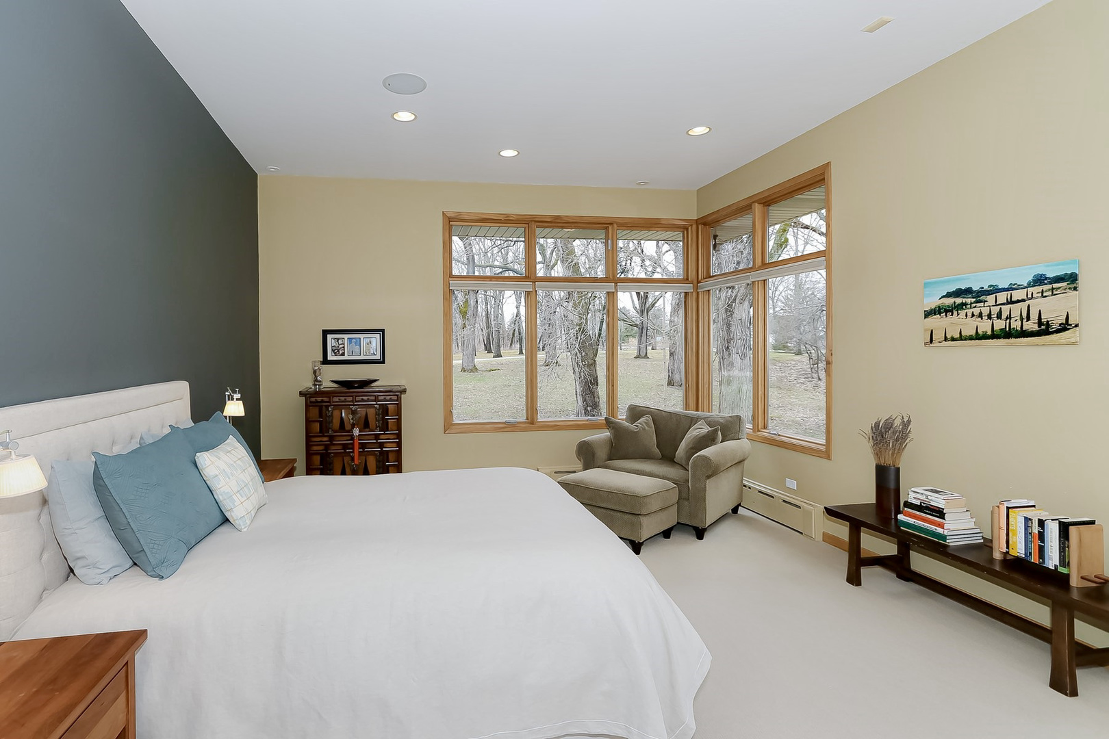 363 Bateman Road Barrington Hills, IL 60010 - Photo 19 of 40 a spacious bedroom with a bed and a couch